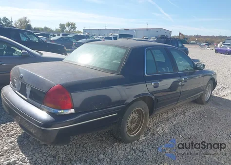 2001 Ford Crown Victoria Lx z USA, uszkodzony, nr VIN 2FAFP74W31X134040